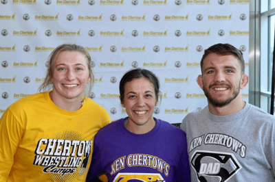 Kylie Welker, Zain Retherford, and another female coach.
