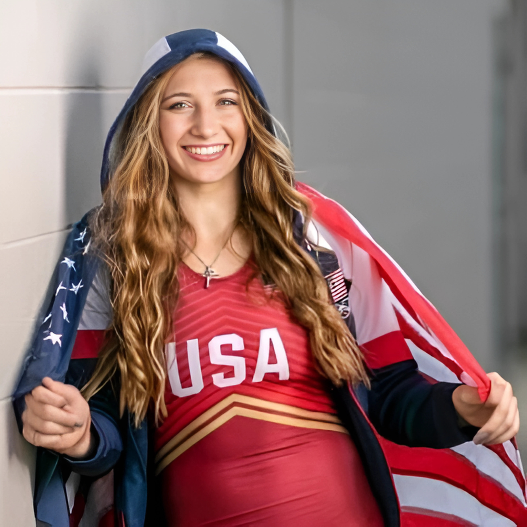 Coach Kylie Welker in her USA Olympic Alternate singlet.