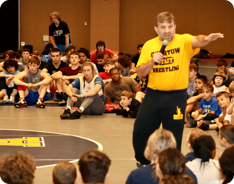 Coach Ken Chertow giving a speech on wrestling technique