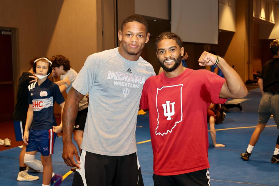 Two assistant coaches at summer wrestling camp. 