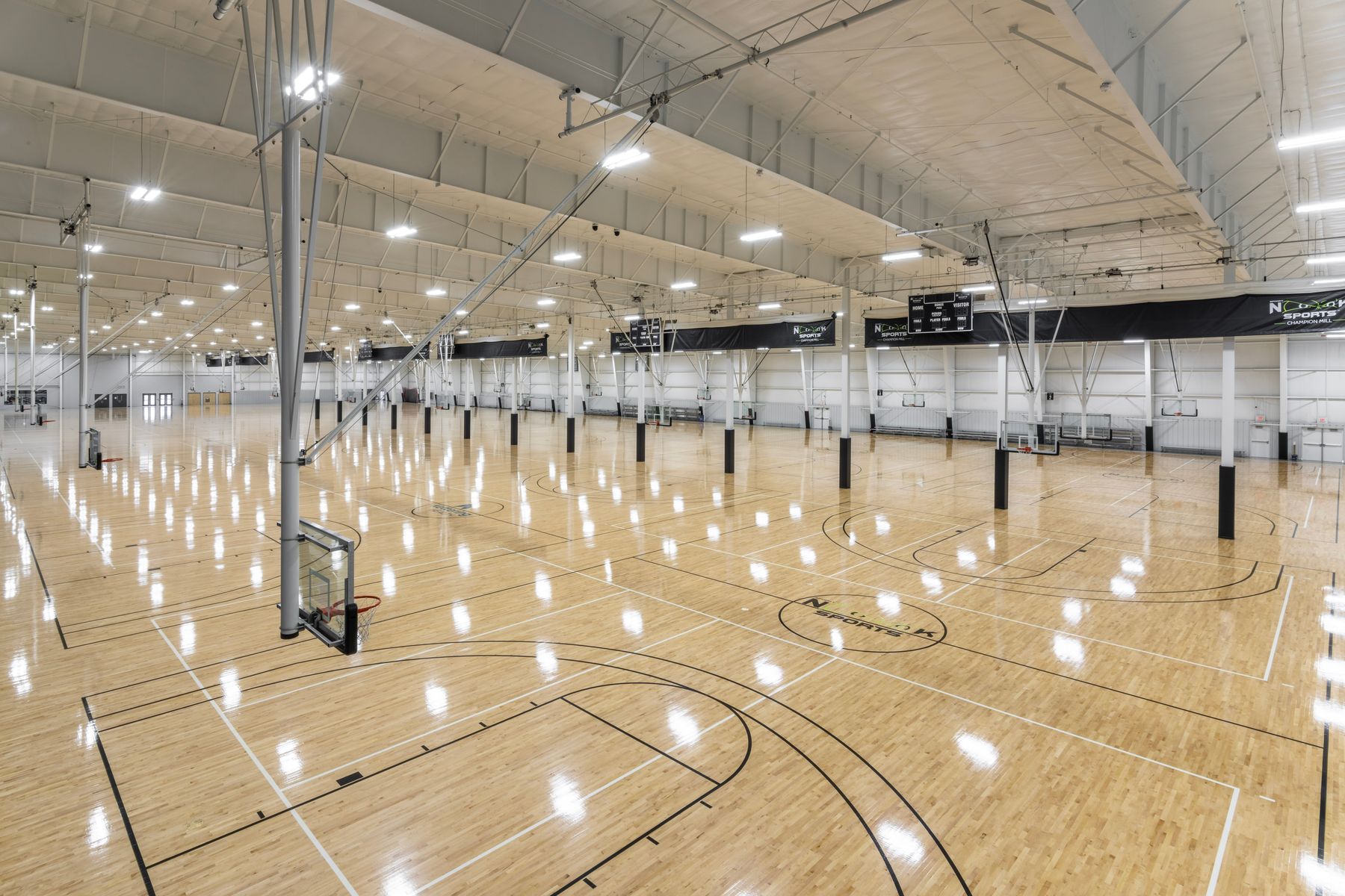 Rows of hardwood courts inside Champion Mill, home of Ken Chertow's Ohio summer wrestling camp