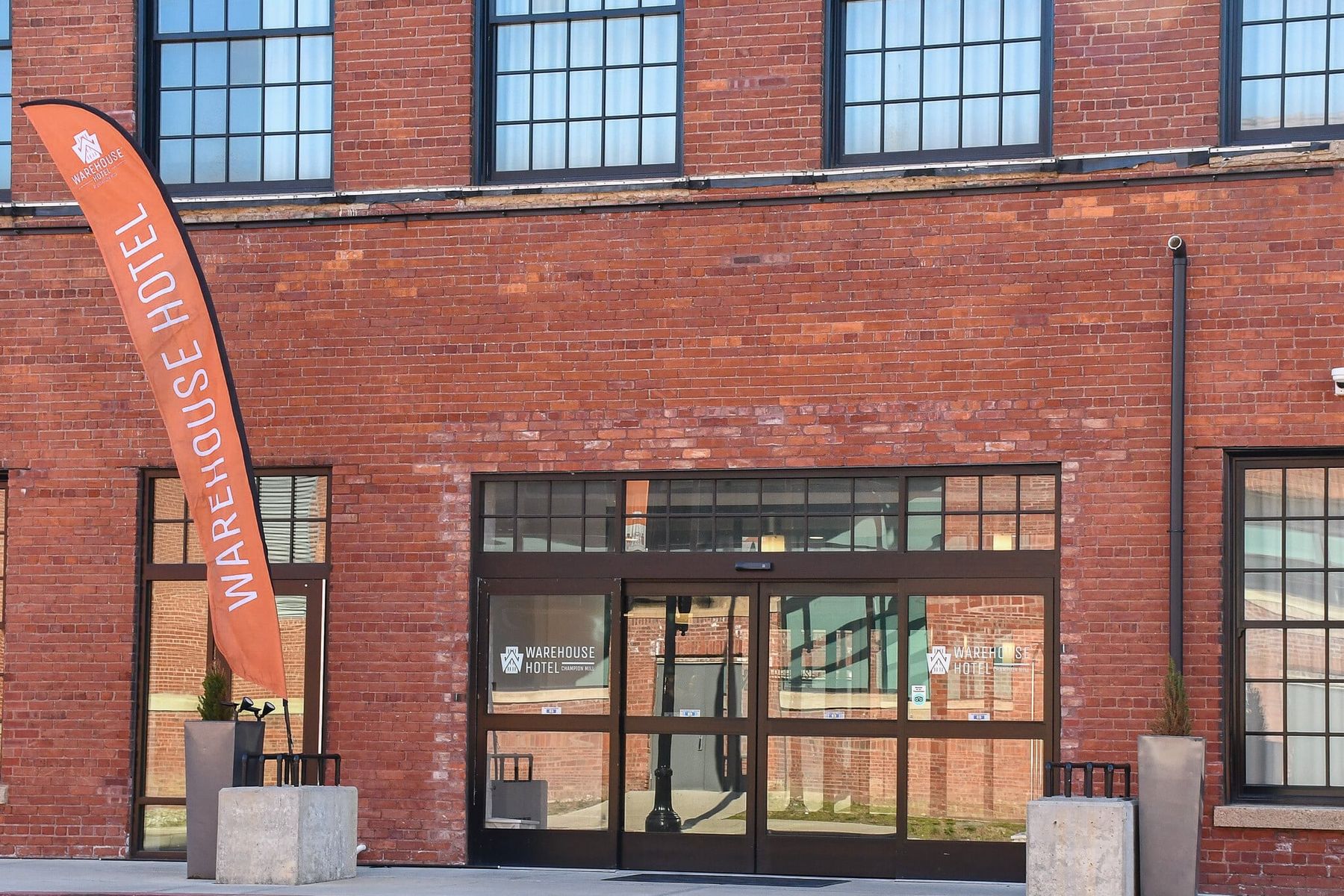 The brick front of the Warehouse Hotel at Champion Mill in Hamilton, Ohio, Ken Chertow's Ohio camp hotel