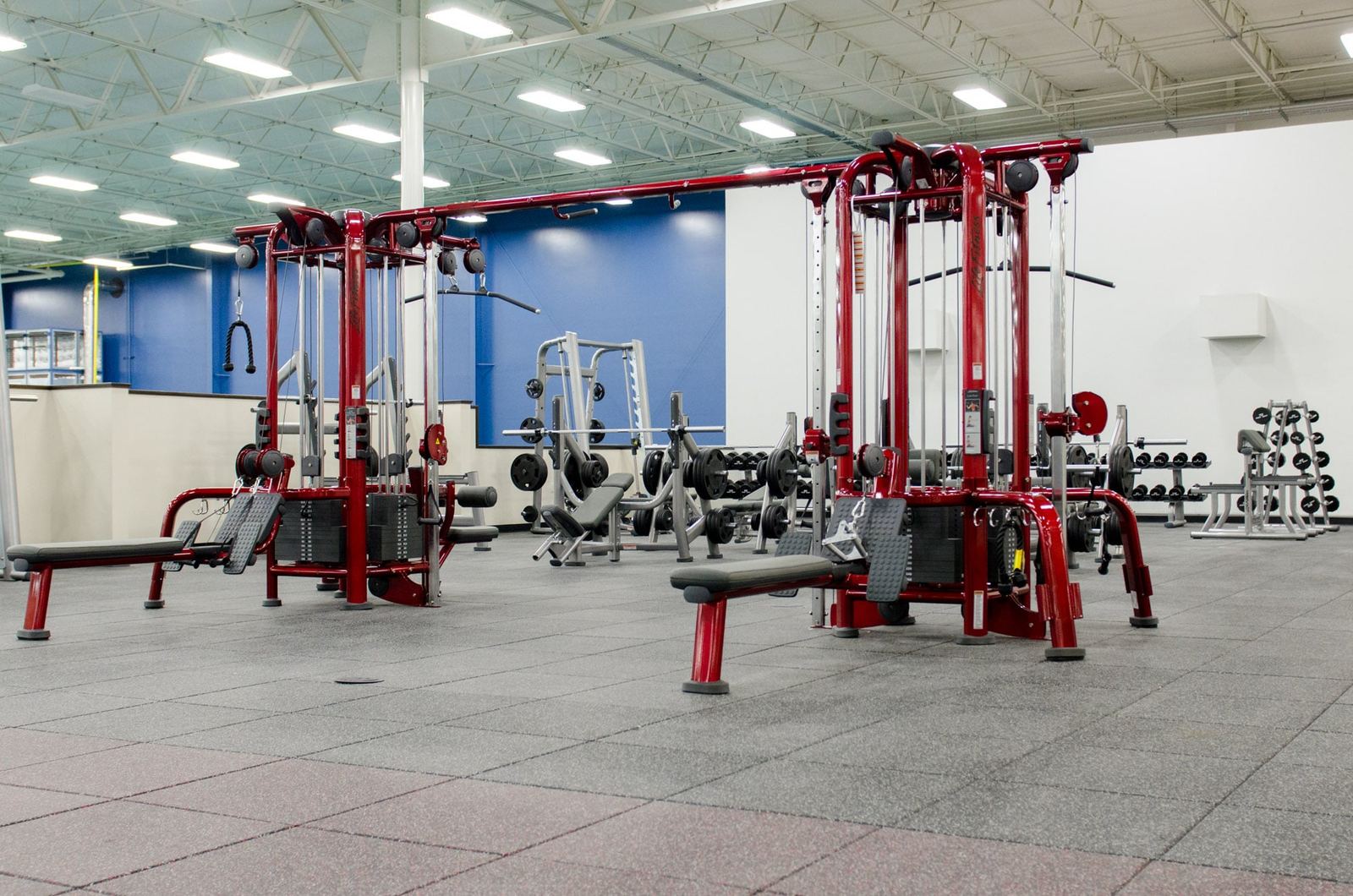Red cable machines, benches and dumbbells in the Spooky Nook fitness center, Ken Chertow's Pennsylvania camp venue